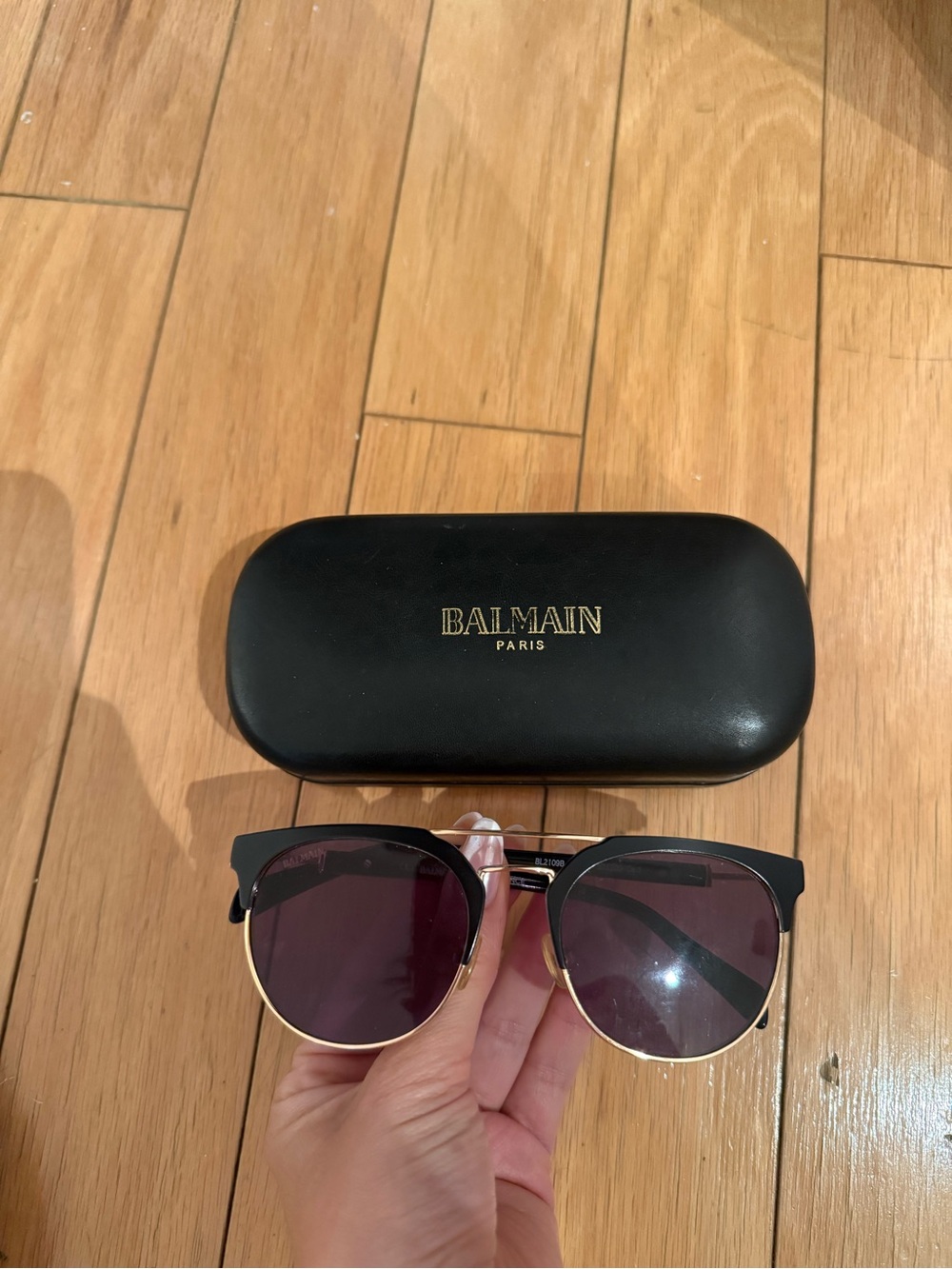 Balmain Black and Gold Sunglasses with Dark Purple Lenses
